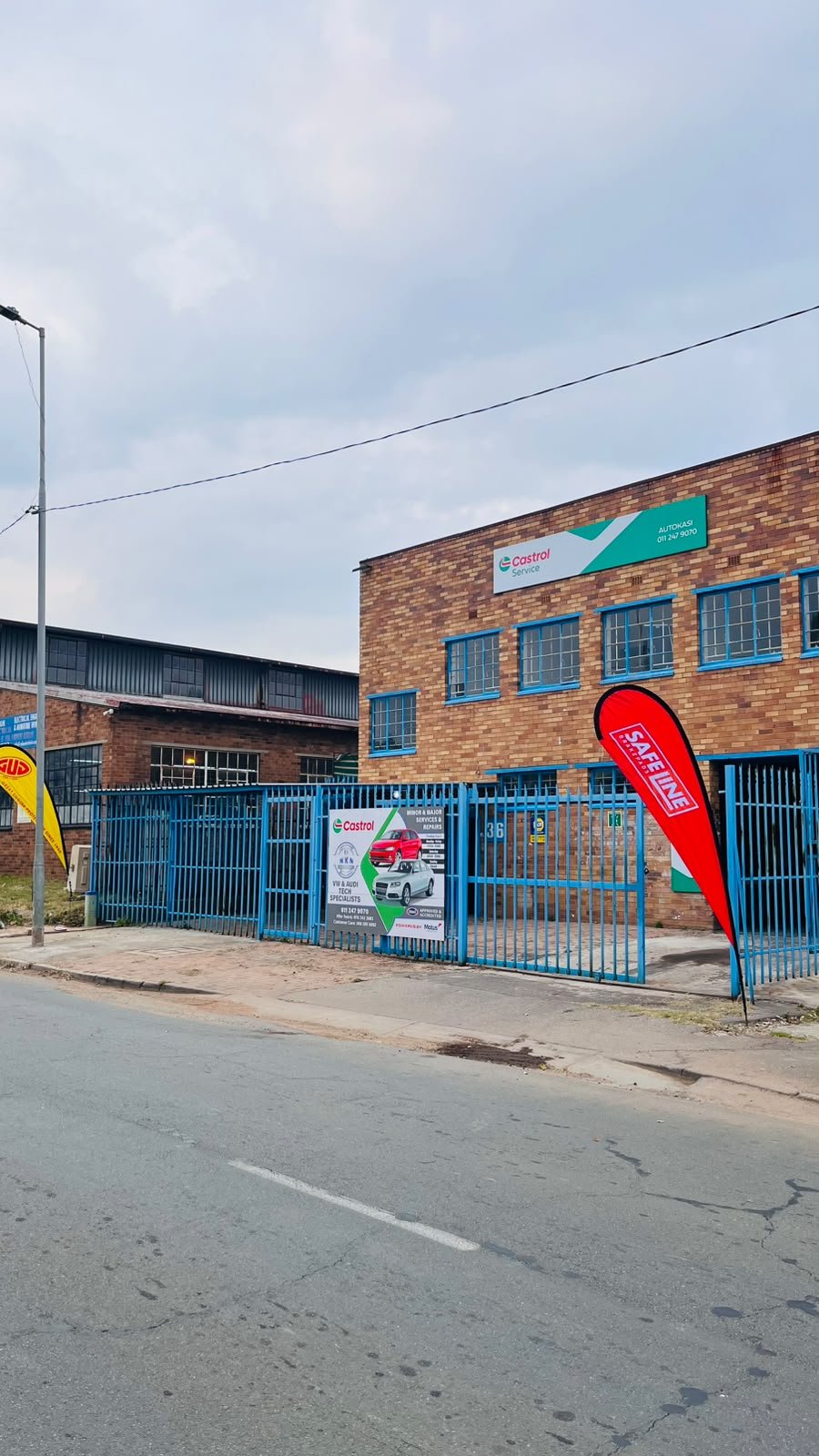 Vehicle raised on the AutoKasi workshop ramp during a service